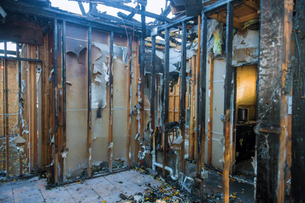 Professional Fire Damage Restoration technician working in Taos Pueblo, NM